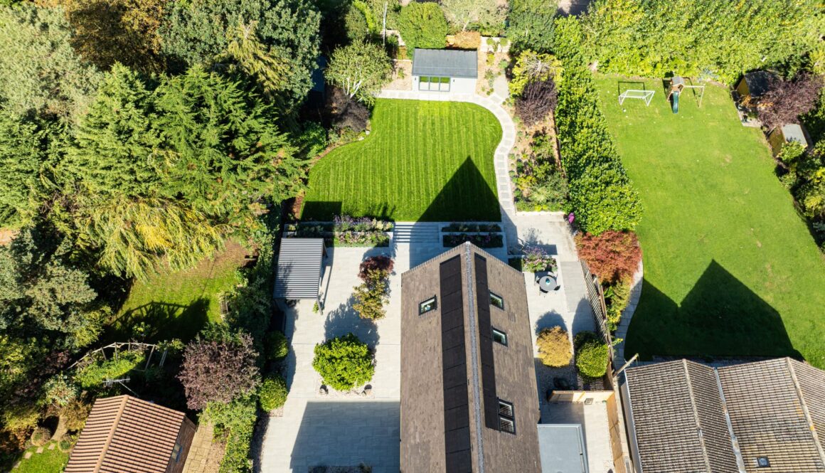Drone footage of Pent Haus garden room in large garden with house