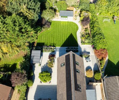 Drone footage of Pent Haus garden room in large garden with house