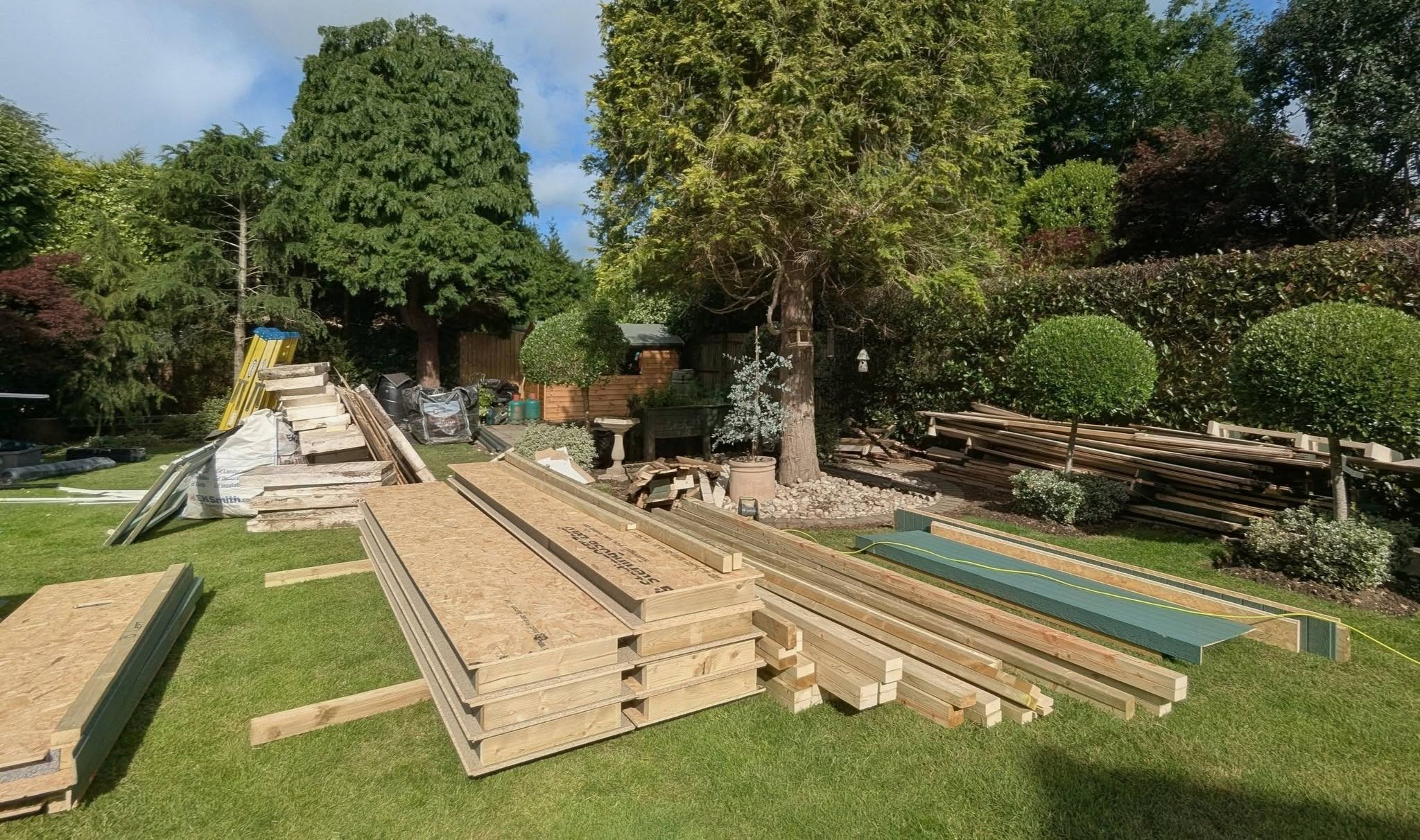 pent haus garden room kit contents laid out ready to build