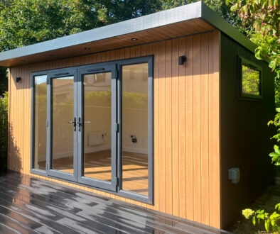 4.8m x 3.2m Signature SIPs Building Pent Haus Garden Room clad in ToughWood 'Cedar' Right Angle