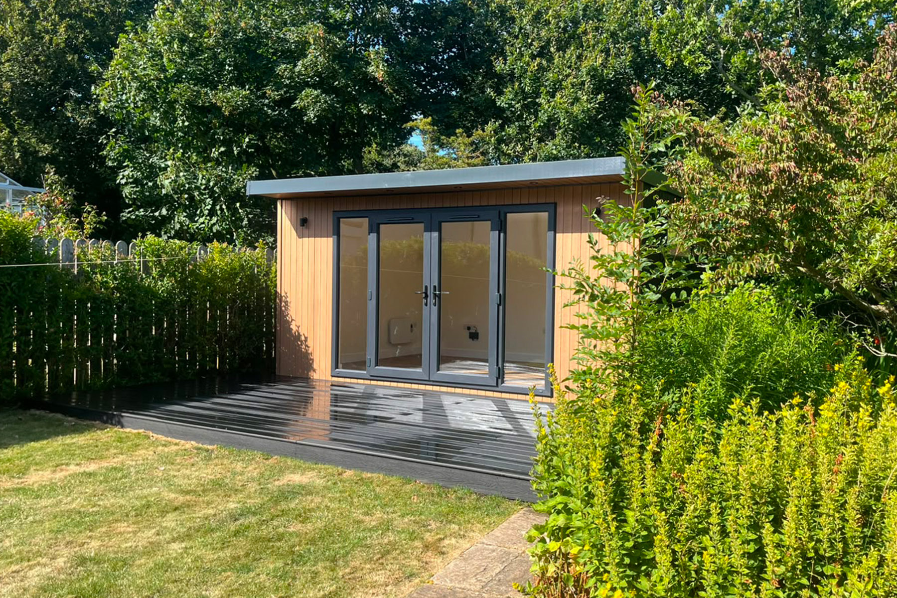 4.8m x 3.2m Signature SIPs Pent Haus garden room in ToughWood cladding 'Cedar'